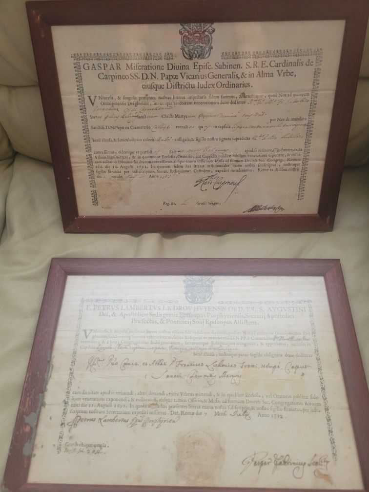 Two (2) genuine Early 1700's Vatican Reliquary Authentication Certificates