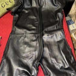 This is a black Mens leather romper/jumpsuit Shirt/shorts