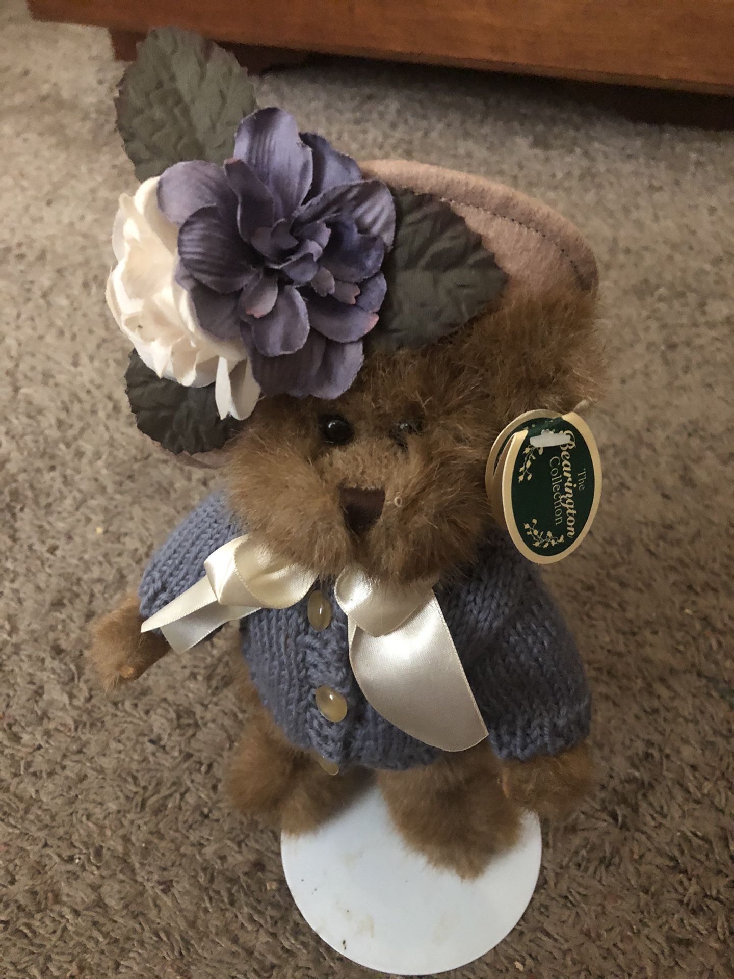 Bearington Bear on a stand with flower hat and sweater
