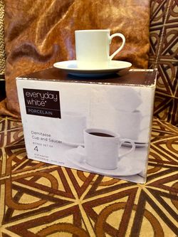 "Everyday White" porcelain demitasse cup and saucer sets.