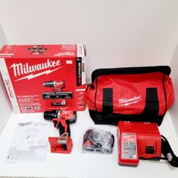 M18 compact brushless 1/2 inch drill kit. Comes with the drill, one M18 REDLITHIUM CP2.0 battery still sealed, M12/M18 multi-voltage charge