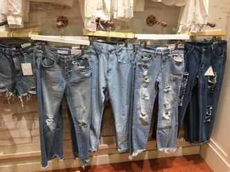 Tons of brand new denim and tops all on sale