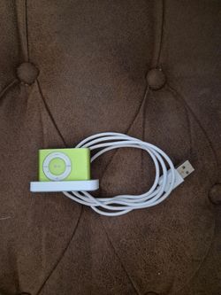 green Apple iPod Shuffle, specifically a 2nd generation model.