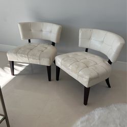 Pair Of Faux Leather Armchairs. Needs Reupholstering