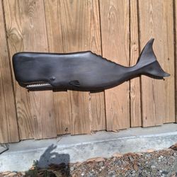 Carved wooden whale