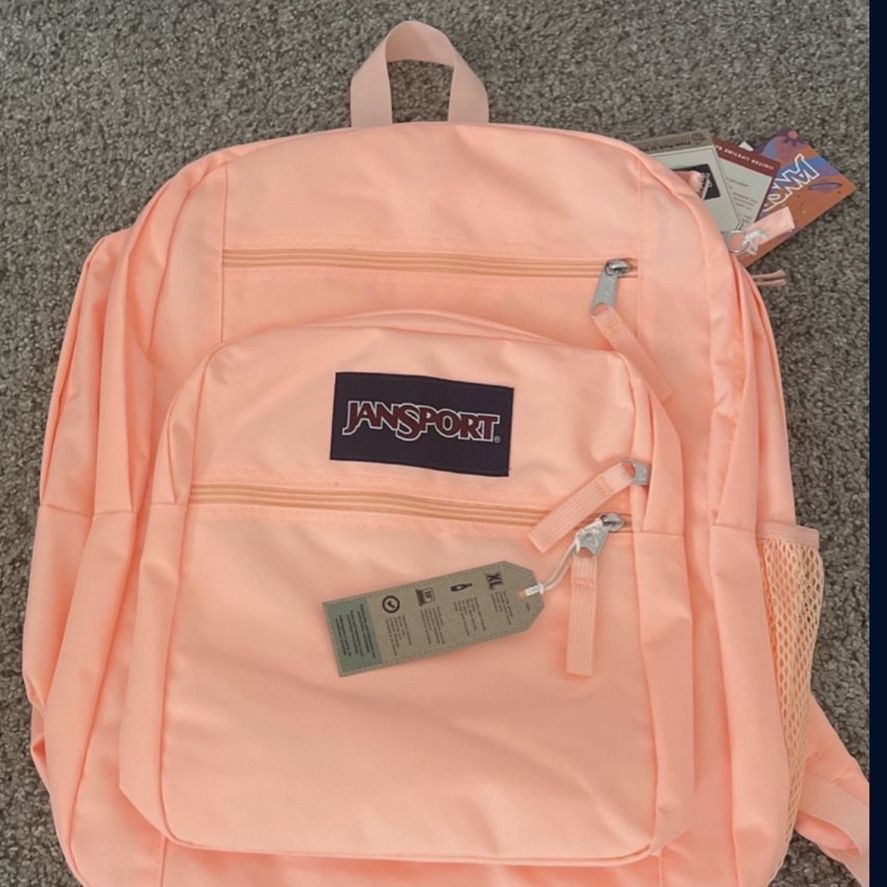 big coral jansport backpack Student Laptop Backpack, 34 Liter Capacity, Peach Neon Electronics Zippered utility pockets make staying organized effortless JanSport Unisex Big Student Diamond