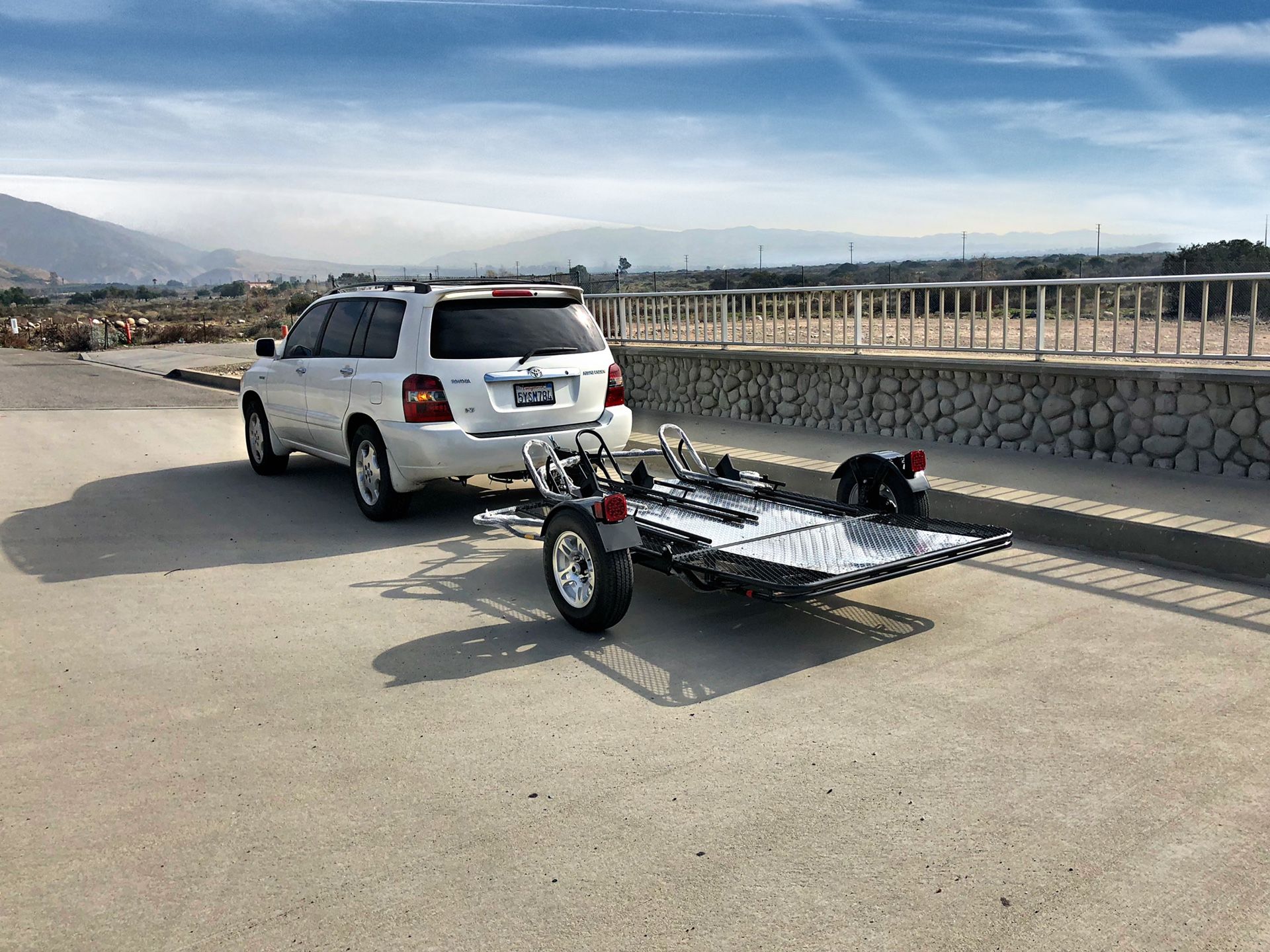 Motorcycle trailer tows 3 motorcycles rated for 2000lb folds for storage
