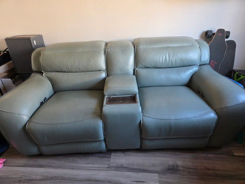 Reclining love seat with wireless charging console