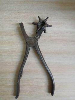 Antique leather hole punch