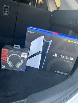 PS5 Pro w/ controller and headset