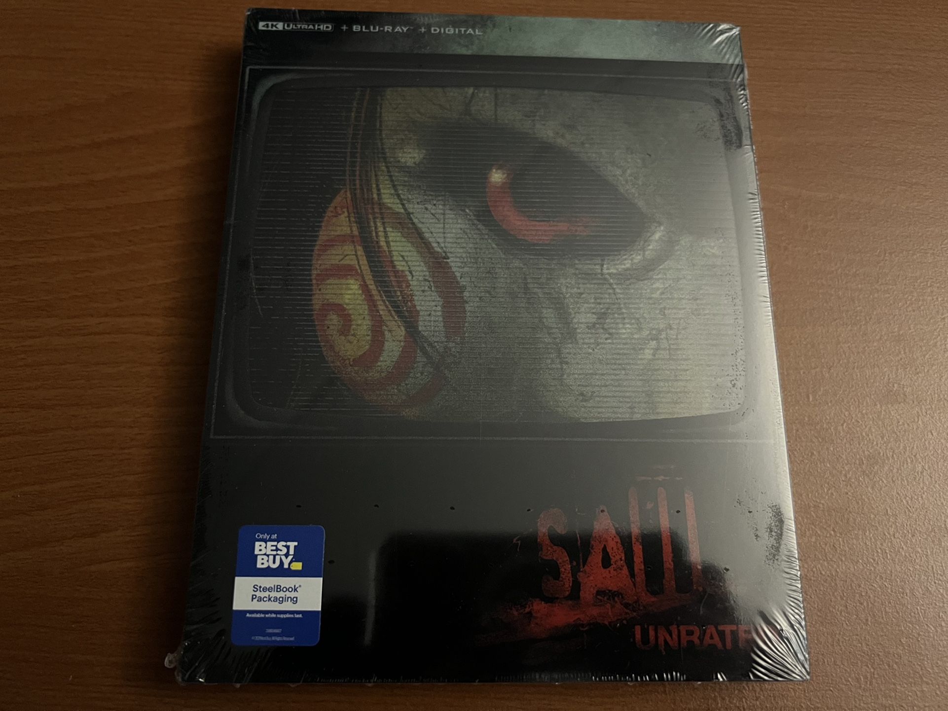 Saw (Exclusive, Steelbook, 4K Ultra HD, Blu-ray, and Digital)