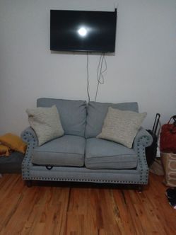 Blue loveseat $100