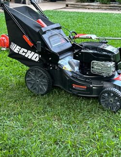 $475$. 21 in. 190 cc Briggs and Stratton Gas 3-in-1 Dual Blade RWD Self-Propelled Lawn Mower with Single Lever Deck Adjustment