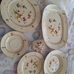 12 Place Setting Of China Plus Serving Dishes.