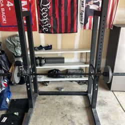 Squat Rack, Barbell And Plates