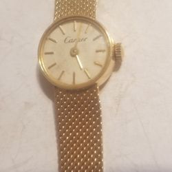 18K gold Cartier watch the  18K gold  ban is attached to the watch work perfectly  Very good condition use
