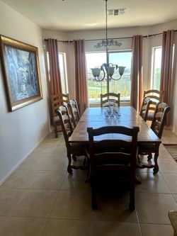 Dining table with 8 chairs with 2 extensions