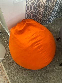 3 orange beanbags