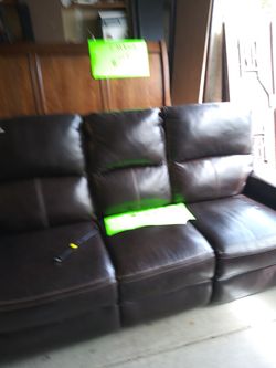 Couch with power recliners