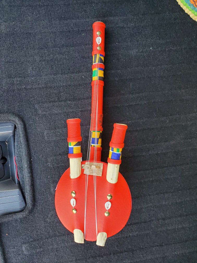 Traditional African Guitar Decoration 