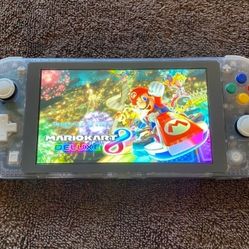 NINTENDO SWITCH LITE NOD + 125 POPULAR SWITCH GAMES and 7500 RETRO GAMES