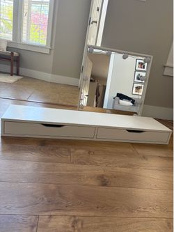 IKEA floating shelf with mirror