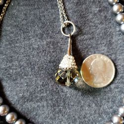 Gray Beaded  Necklace  w/ a  smokey grayish  glasss pendant 