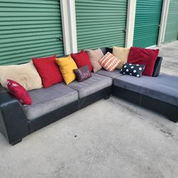 Gray Two Piece L Shaped Sectional Couch with Throw Pillows