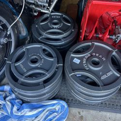Brand new 45lb cast iron weight plates olympic 