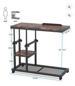 All new height adjustable C table  with tilt