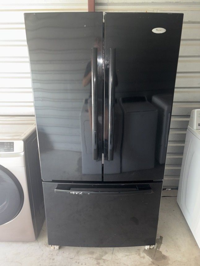 Black Whirlpool Refrigerator And Freezer