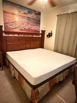 California King bedroom set featuring a wooden headboard designed to be wall-mounted, separate from the bed.