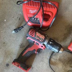 red Milwaukee cordless drill/driver