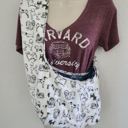 This handmade sling tote is the perfect carrier for your small dog. It is reversible, meaning you can switch up the design to suit your style. The dim