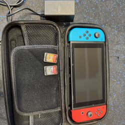 Nintendo Switch with two games