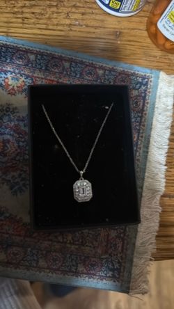 diamond frame initial pendant necklace in 14kt white gold.