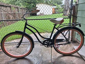 Swinn bike and a Hitachi two seater push cart