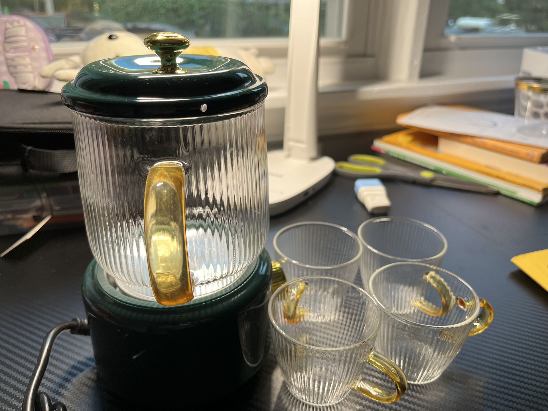 1.2-liter glass-bodied electric kettle, ideal for brewing coffee, preparing formula