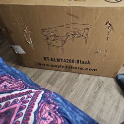 Massage table with headrest.