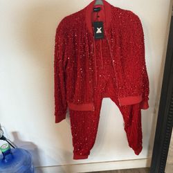 Red sequin 2 pc jogger set with drawstring pants and bomber jacket with side pockets.