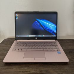 Pink Hp laptop and Changer