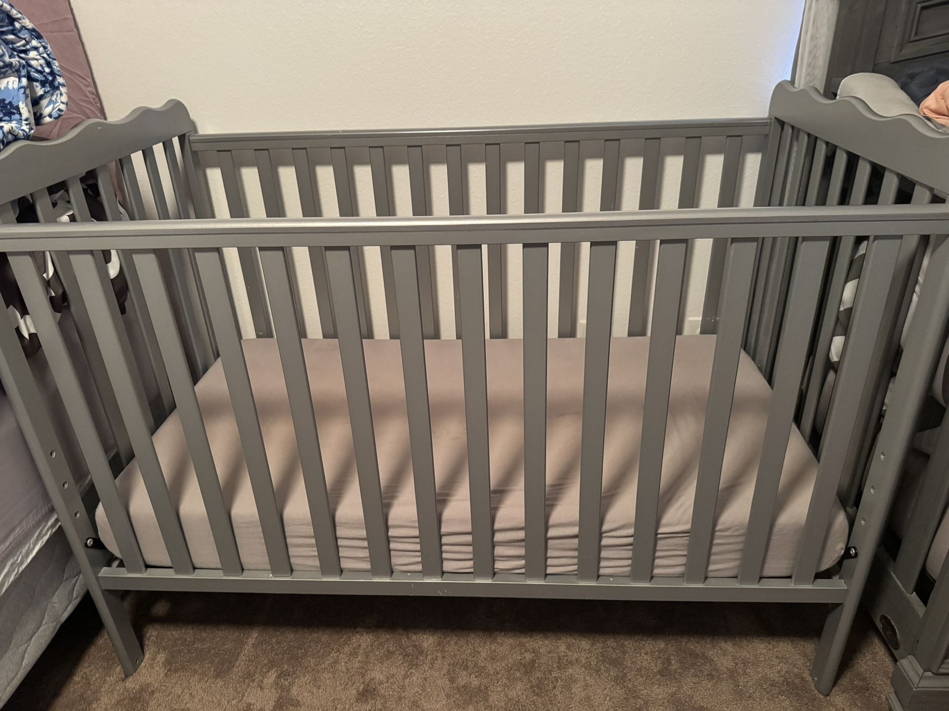 Baby crib with mattress