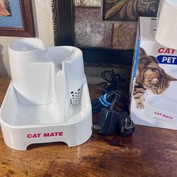 NWOT Cat Mate Pet Fountain - 70 Fluid Oz. W NEW FILTER & USED Cat Mate Pet Fountain - 70 Fluid Oz. WITH NEW FILTER! PRICE IS FOR THE PAIR!