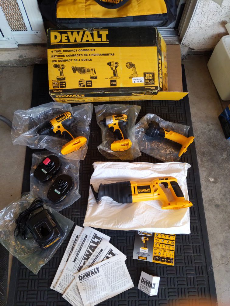 Dewalt 18V 4piece set , impact drill, drill , sawzall, flashlight, two batteries , charger, carry bag, manuals