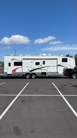 Two bedroom fifth wheel travel trailer, toy hauler 34 foot