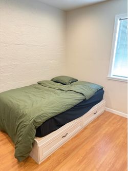Full sized Mattress and Frame with built in bottom pull out drawers