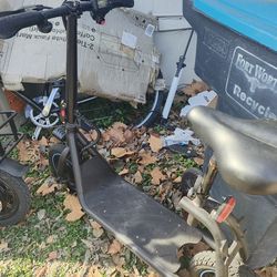 Electric scooter with seat and basket