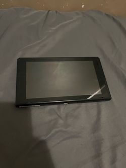 Nintendo switch with two controllers, joysticks, and a joy-sticks grip for 220