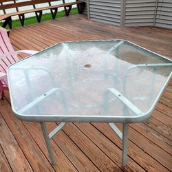 Patio Table With Four Pink Chairs