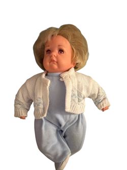 Petite 12" Gotz Artist Baby Doll, with a vinyl head and limbs and a cloth body, featuring facial sculpting by artist Hildegard Gunzel.  The doll is a 
